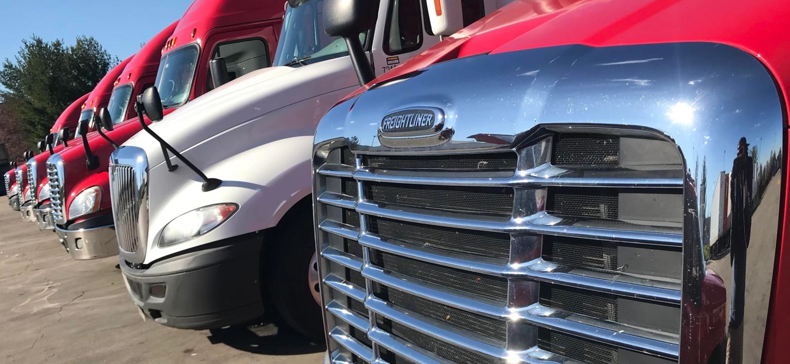Fleet trucks parked on site for mobile fleet cleaning near Louisville, KY